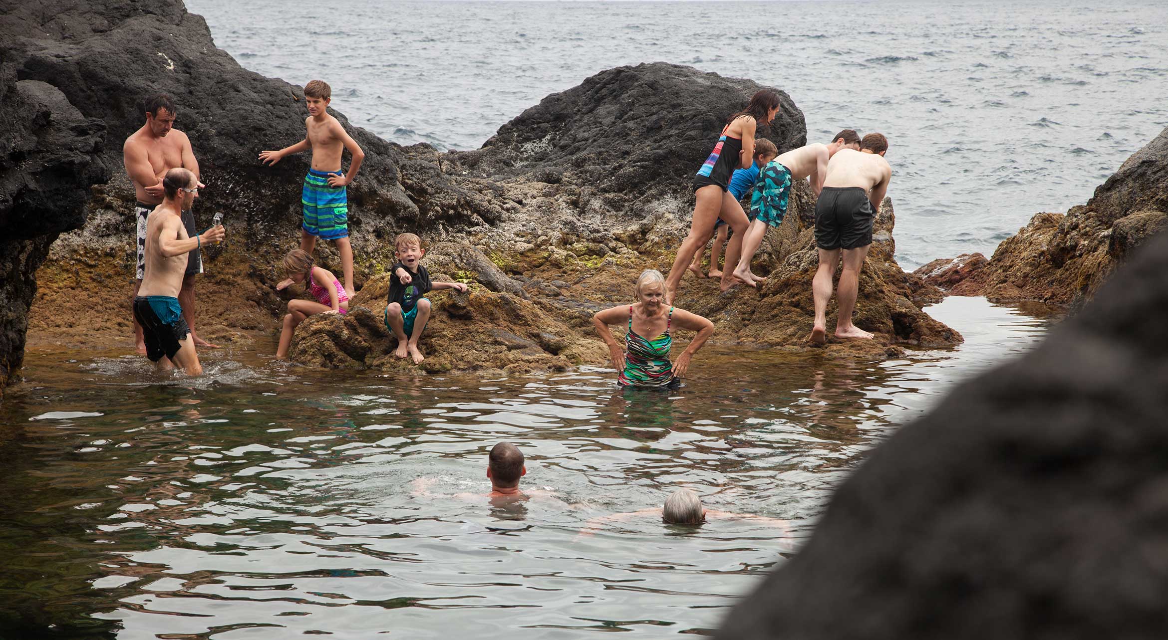 group of people enjoying the beach