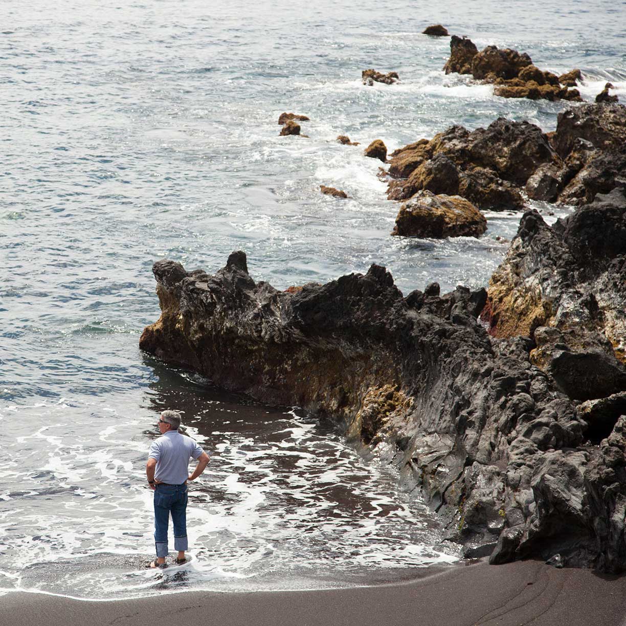 Our island customer enjoying the feeling of the ocean. Our Faial full day tour will take us all around